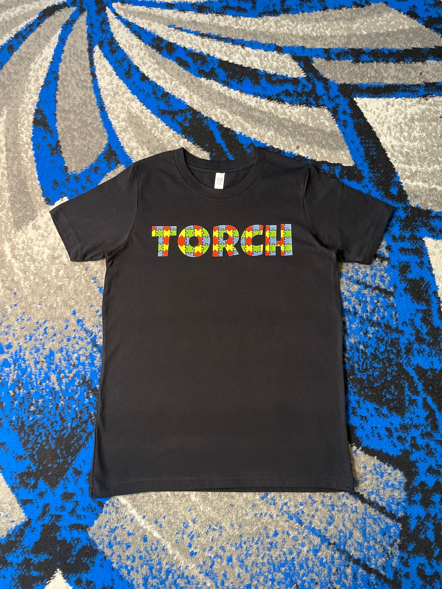 Torch puzzle tee