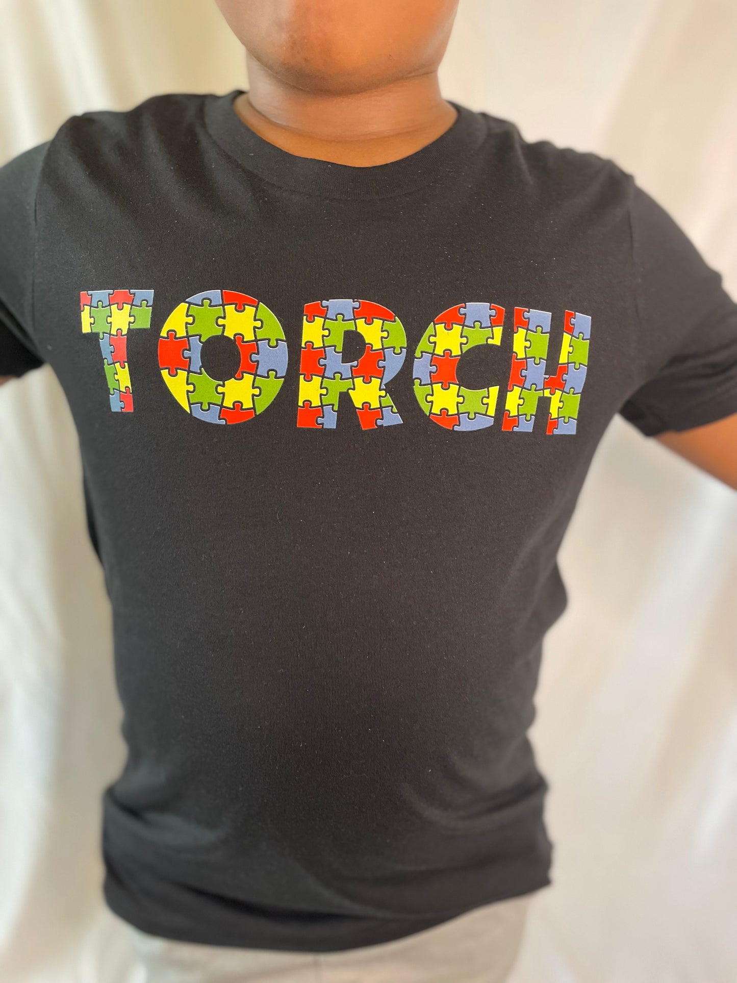 Torch puzzle tee